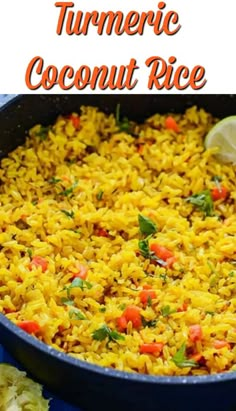 a close up of a pan filled with rice and garnished with cilantro