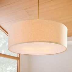 a light fixture hanging from the ceiling in a room