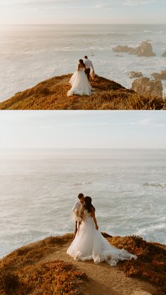 the bride and groom are standing on top of a hill overlooking the ocean in their wedding gowns