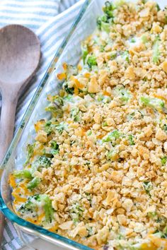 Close-up of a creamy broccoli casserole topped with a golden, buttery Ritz cracker crumb layer in a glass baking dish, with a wooden spoon beside it. Easy Broccoli Casserole, Friendsgiving Food Ideas, Favorite Casserole Recipes, Cheesy Broccoli Casserole, Delicious Broccoli, Casserole Side Dishes, Classic Southern Recipes, Broccoli Recipes Casserole, Friendsgiving Food