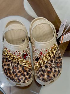 Blingedout leopard print custom crocs in BONE WHITE can be made in different colors  Bling Bling  Custom Made Crocs Bling Crocs, Bedazzled Shoes, Custom Crocs, Western Bling, Pretty Sneakers, Crocs Fashion, Rhinestone Projects, Custom Bling, Clogs And Mules