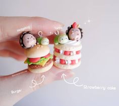 a hand holding two miniature hamburgers with different toppings on them, and the words burger