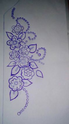 a drawing of flowers and beads on paper