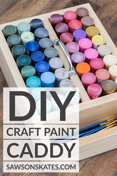 Craft paints in a DIY storage caddy Diy Art Supplies Storage, Diy Acrylic Storage, Best Craft Room Ideas, Acrylic Paint Organization Diy, Paint Brush Storage, Diy Paint Storage, Paint Holder Storage, Diy Craft Supply Storage, Paint Bottle Storage