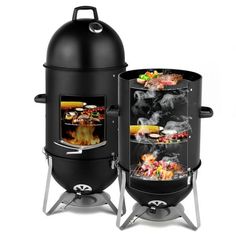 two large black bbqs sitting next to each other