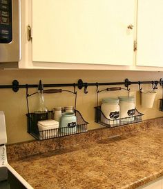 the kitchen counter is clean and ready to be used as a spice rack for spices