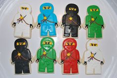 the lego ninja cookies are decorated to look like they're ready for battle with each other