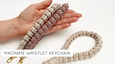 there is a hand holding two bracelets made from macrame twisted keychain