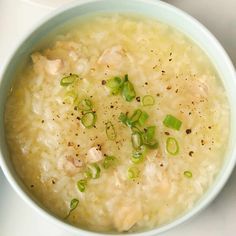 a white bowl filled with soup on top of a table