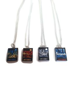 "Each book features the UK cover of The maze runner. The books are made from paper and three sides show white 'pages'. Each book features an image on the front cover, back cover and spine. The charms are about 3/4 of an inch long. Each necklace comes with an 18\" silver plated chain." Maze Runner Book, Anime Necklace, Maze Runner Funny, Maze Runner Movie, Newt Maze Runner, Maze Runner Series, Canvas Art Projects, Book Necklace, The Maze Runner