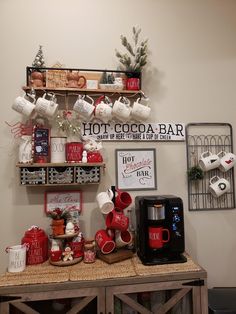 the coffee bar is decorated with red and white items, including cups and mugs