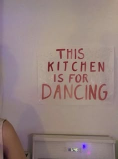 this kitchen is for dancing on the wall