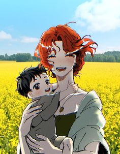 a woman holding a child in front of a yellow field