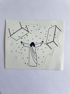 a piece of paper with an image of a person holding two chairs in the air