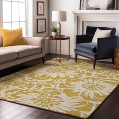 a living room filled with furniture and a yellow rug on top of a hard wood floor