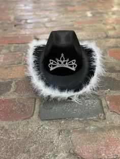 Looking for a fun gift for any party, girls night out, or bachelorette party?  This Adorable cowgirl hat is any princesses dream. Perfect for birthdays, dressing up, or heading to the rodeo! We attached a sparkly feathered boa around the brim to add some sassy flair. The princess tiara is perfect for any girl! One size fits most ADULTS up to 22inches in size. The perfect one size hat for a party! *children sizes are also available in our shop !! Size: fits most adults from 12 years old to 105yrs Pink Cowgirl Hat, Bachelorette Party Hat, Party Girls Night, Rootin Tootin, Halloween Hat, Hat Party, Pink Cowgirl, Hat Fits, Halloween Hats