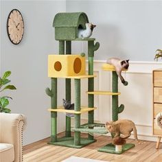 a cat tree with several cats on it in a living room next to a clock