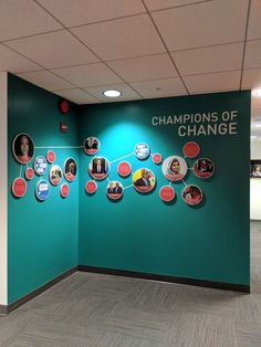 a wall with many different pictures on it and the words champions of change above them