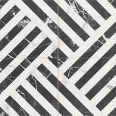 black and white marble tiles with diagonal lines in the middle, on top of each other