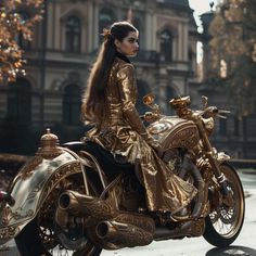 a woman sitting on top of a gold motorcycle