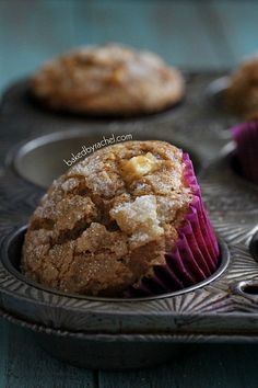 some muffins are sitting on a tray