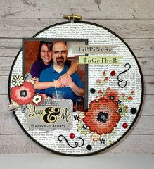 a man and woman are holding each other in front of a clock with words on it