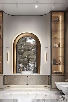 a bathroom with a large arched window next to a sink