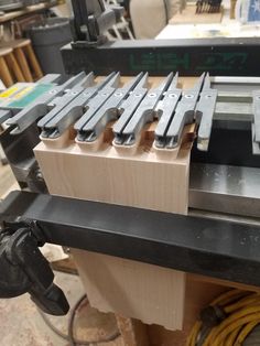 a machine that has some wooden pieces on it