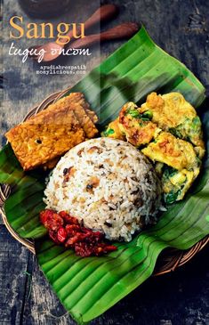 a plate with rice and other food on it