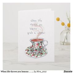 a card with a tea cup and saucer on it, which reads when life throws you lemons grab a cupcake