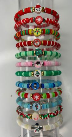 several bracelets are stacked on top of each other