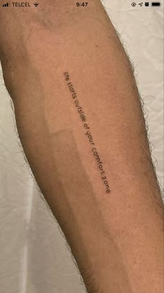 a person with a tattoo on their arm