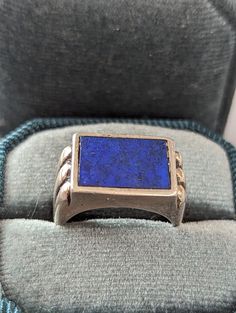 Vintage men's fine Modernist Sterling Silver and Lapis ring. Ring features Modernist design and dark blue Lapis Lazuli flush set. Ring is fully hallmarked and will arrive gift boxed. MARKS Sterling on inside of band. CONDITION In very good to excellent condition with light wear. Please use all pictures as part of item's description. SIZE  7 1/2, ring could be resized by any good jeweler. MATERIALS Sterling Silver, Lapis Lazuli. Lapis Ring, Blue Lapis Lazuli, Modernist Design, Set Ring, Blue Lapis, Sterling Silver Mens, Ring Ring, Rings Statement, Lapis Lazuli