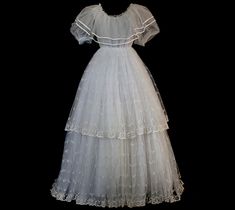 a white dress on a black background