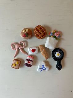 several miniature food items are arranged on a table