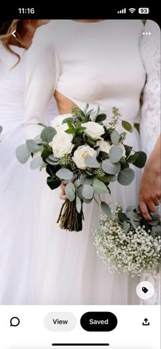 two women in white dresses are holding bouquets