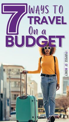 smiling woman in white sunglasses and a yellow long sleeved top and jeans/tennis shoes walking in a city pushing a turquoise suitcase on wheels with text 7 ways to travel on a budget the purpose of money Planning Strategies, Travel On A Budget, Ways To Travel, Cheap Travel, More Money, Plan A