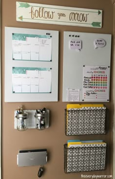 an organized bulletin board with magnets, paper clips and other office supplies on it