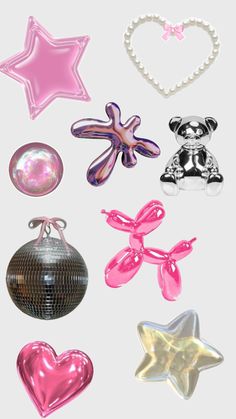 several shiny objects are arranged in the shape of hearts, stars, and teddy bears