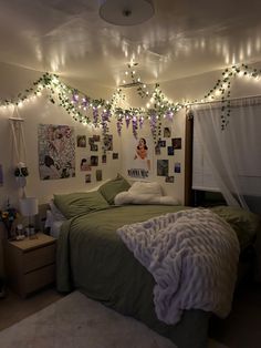 a bedroom with lights strung from the ceiling