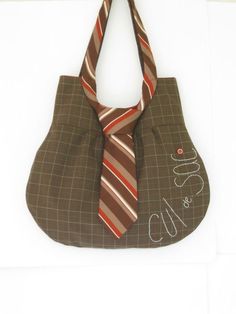 a brown bag with a tie on it