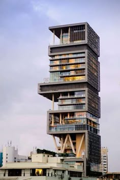 a tall building with multiple floors and balconies