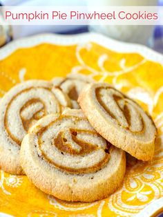 pumpkin pie pinwheel cookies on a yellow and white plate