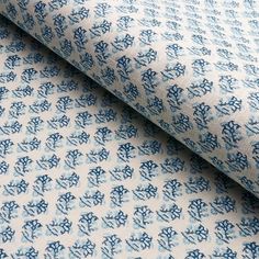 a blue and white fabric with chinese writing on it