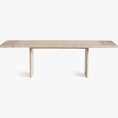 a wooden table with two legs and a rectangular top, against a white background the table is made out of wood