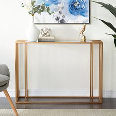 a modern console table with blue flowers on it