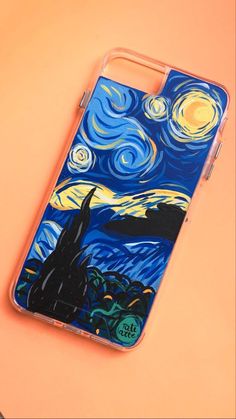 an iphone case painted with the starry night painting on it, sitting on top of a orange surface