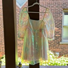 Storia Iridescent Babydoll Dress. New With Tags. Size Large. Has Glitter Flecks In The Fabric. It’s Magical! Color Comes Off Pink/Green/Yellow. Pink Floral Summer Dress, Holographic Dress, Velveteen Dress, Dusty Pink Dresses, Baby Blue Dresses, Cupcake Dress, Pink Green Yellow, Mauve Dress, Mini Skater Dress