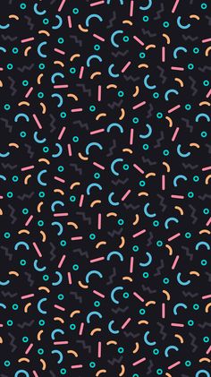 a black background with multicolored confetti sprinkles on it