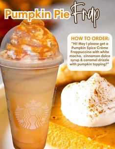 there is a pumpkin pie with whipped cream on top and a drink in the cup